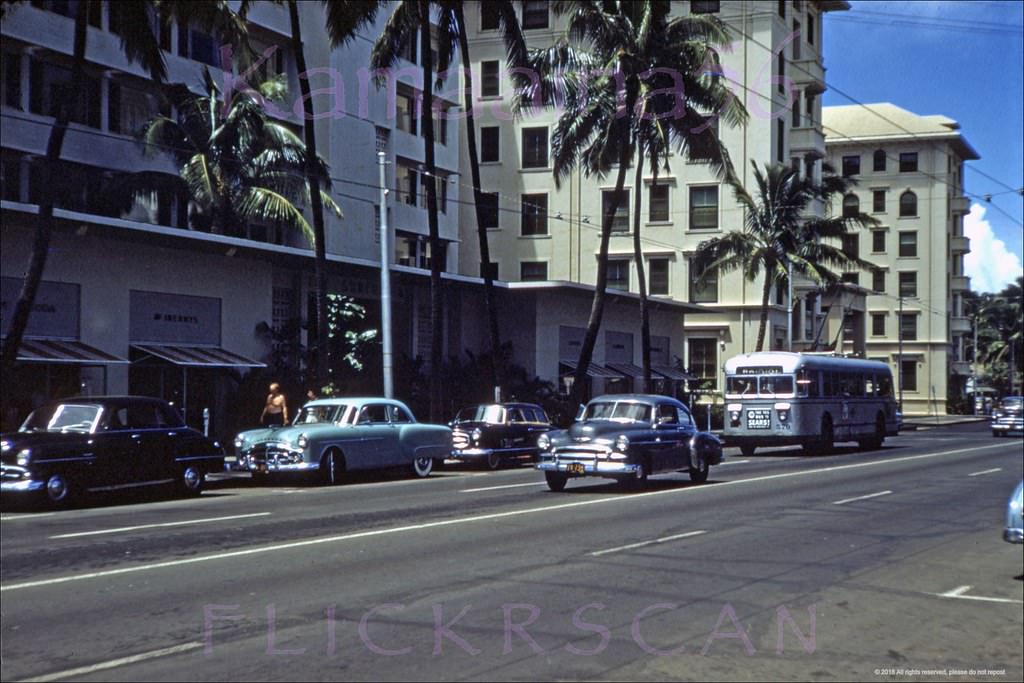 Waikiki’s Kalakaua Avenue viewed from east of the Kaiulani Avenue intersection, 1953