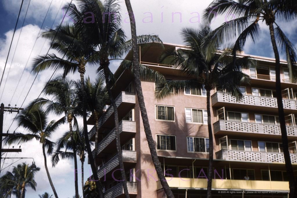 Looking up at the seven floor Edgewater Hotel’s Makai wing on the corner of Waikiki's Kalia Road and Beachwalk, 1950s