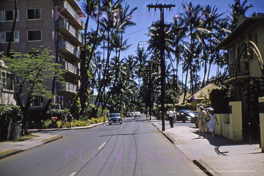 Looking Diamond Head along Waikiki’s Kalia Road from the intersection with Saratoga Road (out of frame at far left), 1957