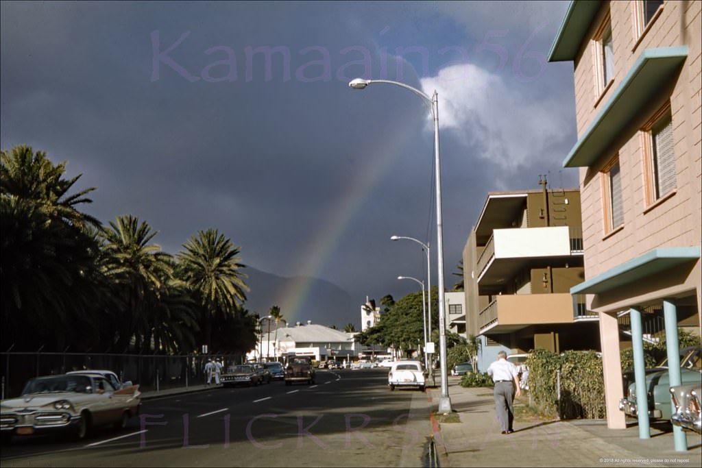 Street level view looking inland along Waikiki’s Saratoga Road across from Fort DeRussy, 1960