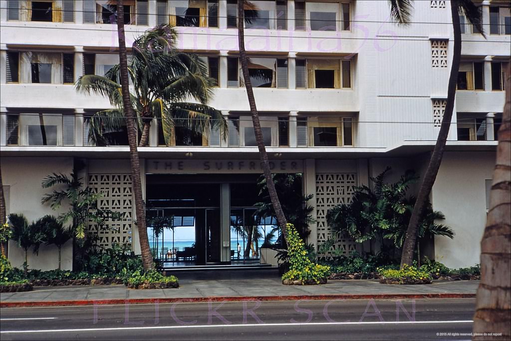The Kalakaua Avenue entrance to the 8-story 1952 Surfrider Hotel next to the Moana Hotel in Waikiki, 1955.