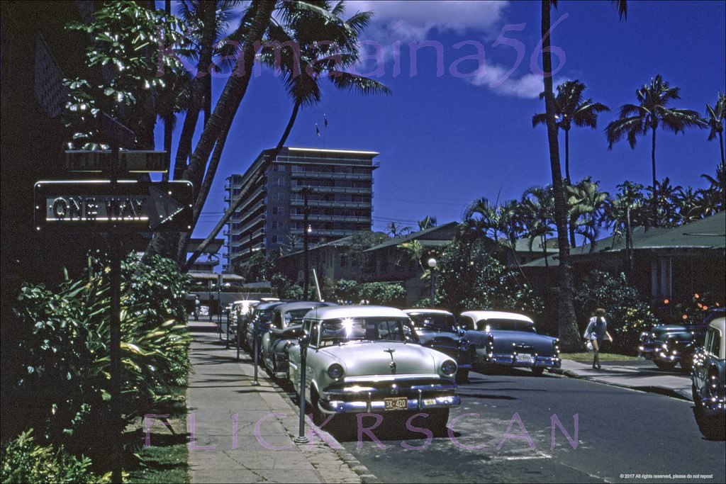 A rather underexposed but interesting view looking south towards the ocean along Waikiki’s Beachwalk from the intersection with Helumoa Road when it used to go through from Lewers, 1957