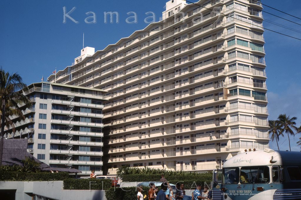 The Reef Hotel and Waikiki Shore Apartment Hotel viewed from Kalia Road at Beachwalk, 1963