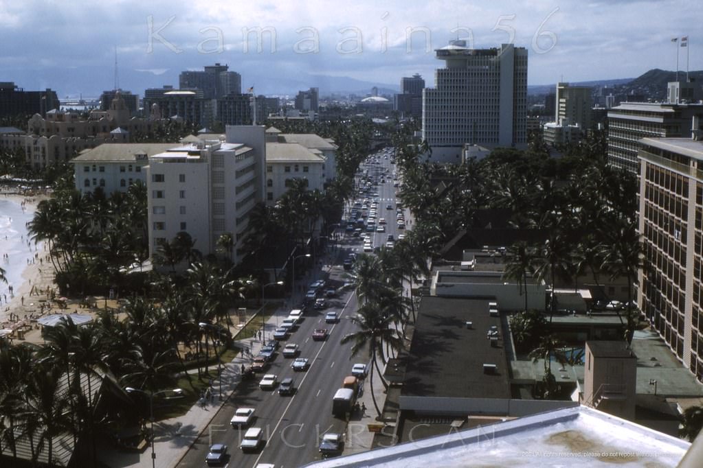 Birdseye view more or less northwest along Waikiki’s Kalakaua Avenue from an unknown vantage point (probably a top floor at the 1962 Waikiki Circle Hotel) near the the corner of Uluniu Avenue, 1965
