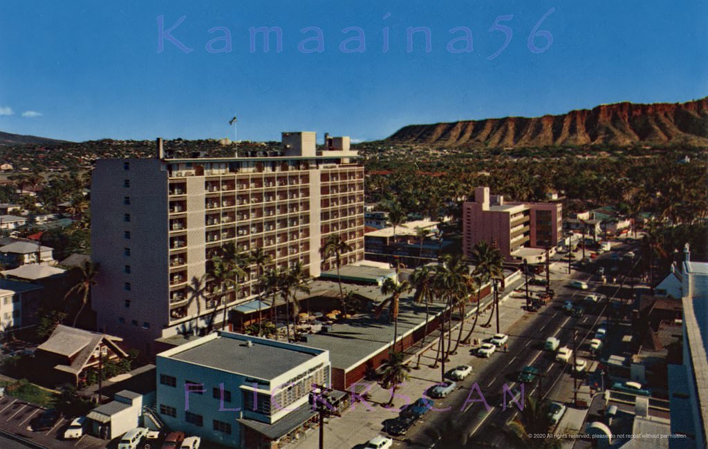 Mauka (inland) side of Kalakaua Avenue between Kaiulani and Uluniu Avenues across from the Waikiki Beach Center, 1950s.