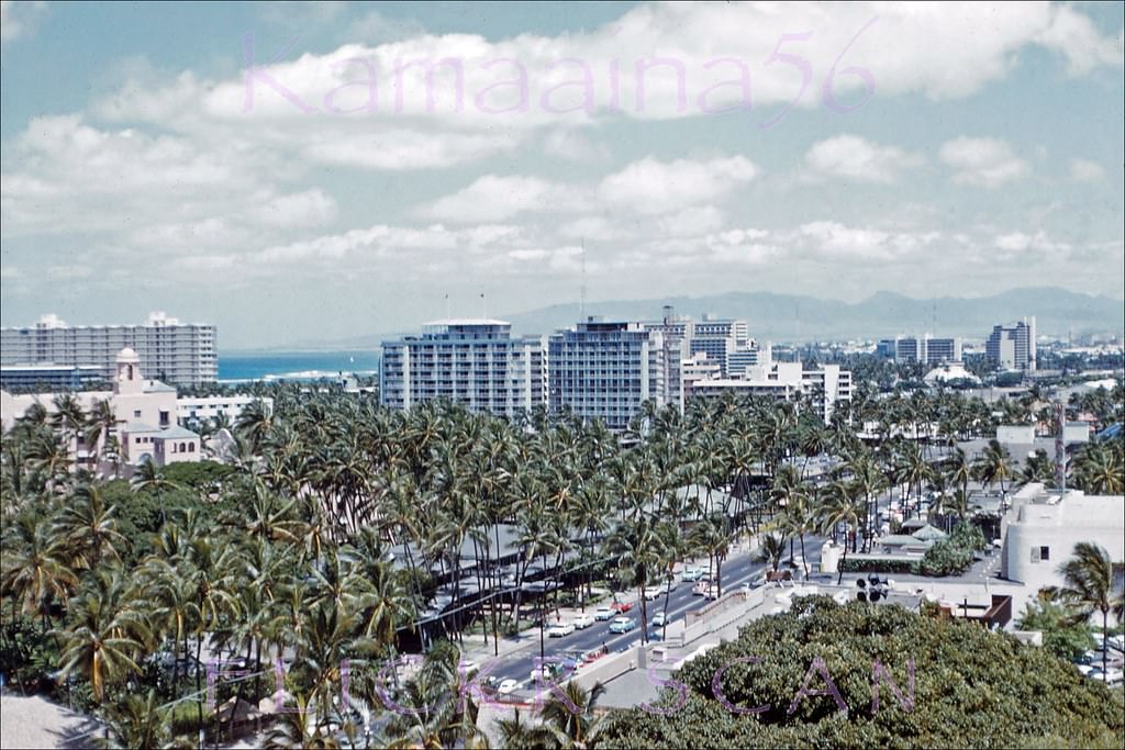 Panoramic view of Waikiki looking west from the Captain Cook restaurant atop the Princess Kaiulani Hotel on Kalakaua Avenue, 1962