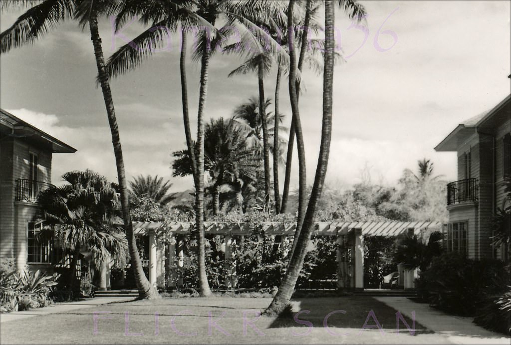 The tranquil courtyard and bungalows across Kalakaua Avenue from the Moana Hotel, 1940.