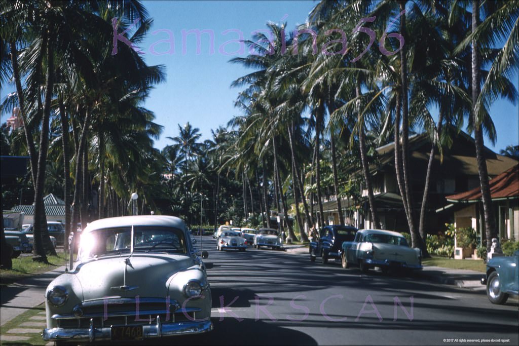 Looking south (towards the ocean) along Waikiki’s picturesque Seaside Avenue, 1956.
