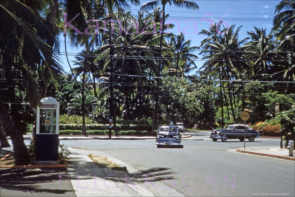 Looking makai (more or less south here) at Waikiki’s Kalakaua Avenue from the corner of Seaside Avenue, 1953