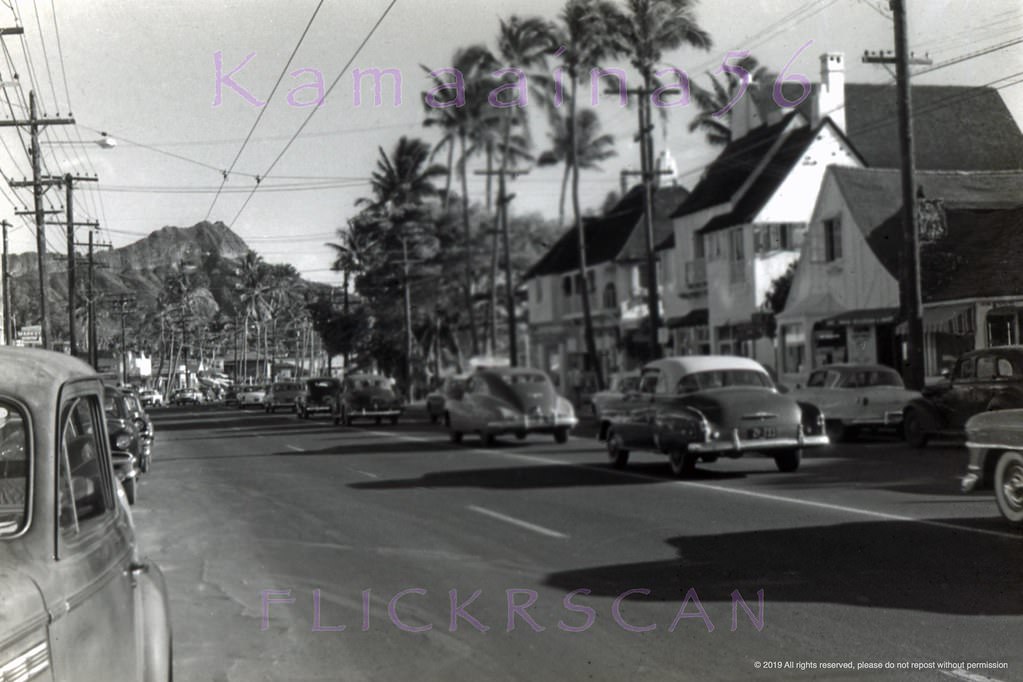 Diamond Head view along Waikiki’s Kalakaua Avenue from near the Kaiulani Avenue intersection, 1950s