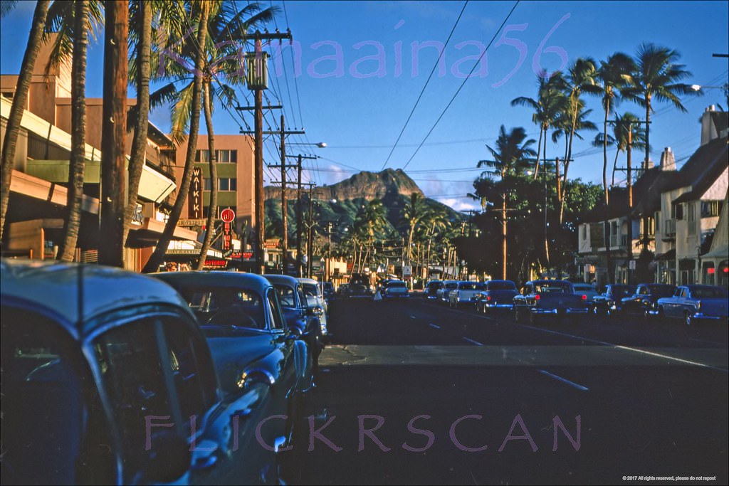 Late afternoon Diamond Head view along Waikiki’s Kalakaua Avenue from in front of the Waikiki Biltmore Hotel, 1956