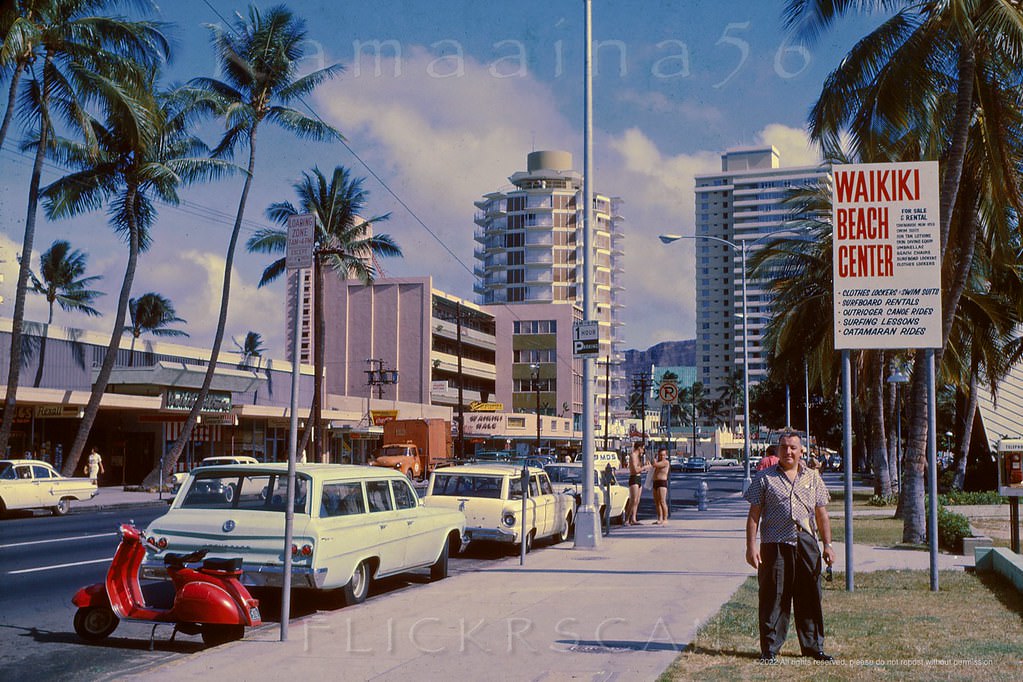Diamond Head along Kalakaua Avenue from the Waikiki Beach Center across from the entrance to the Waikiki Biltmore, 1964.