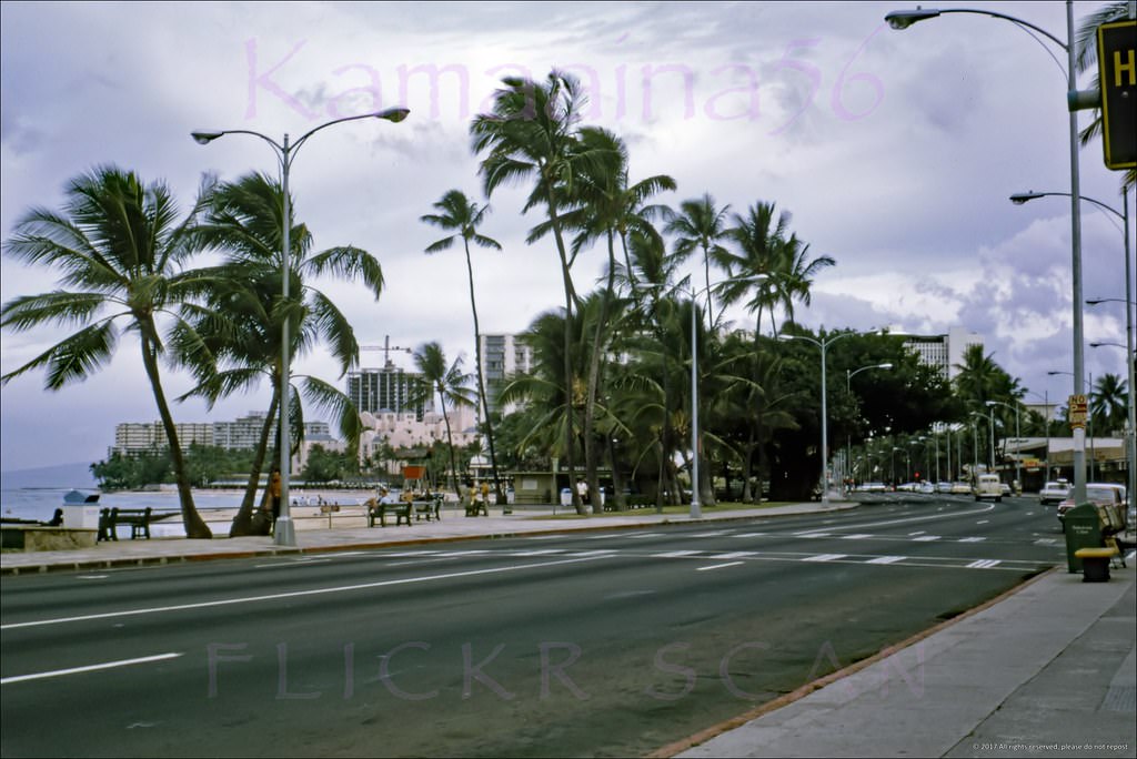 Early morning looking west along Waikiki’s Kalakaua Avenue from around the Liliuokalani Avenue intersection, 1967