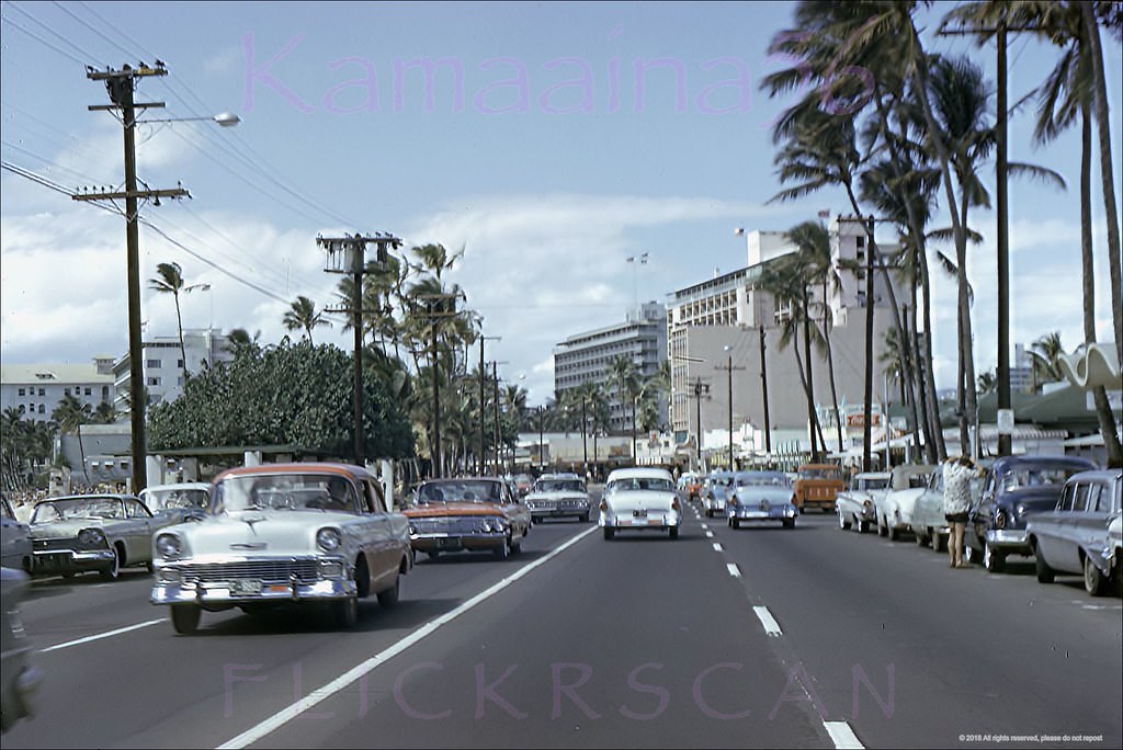 Slightly shaky but instantly recognizable scene looking Ewa (more or less west) along Waikiki’s busy Kalakaua Avenue, 1962