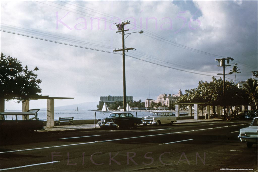 Late afternoon looking Ewa (more or less west here) along Kalakaua Avenue from the Kuhio Beach section of Waikiki, 1960s