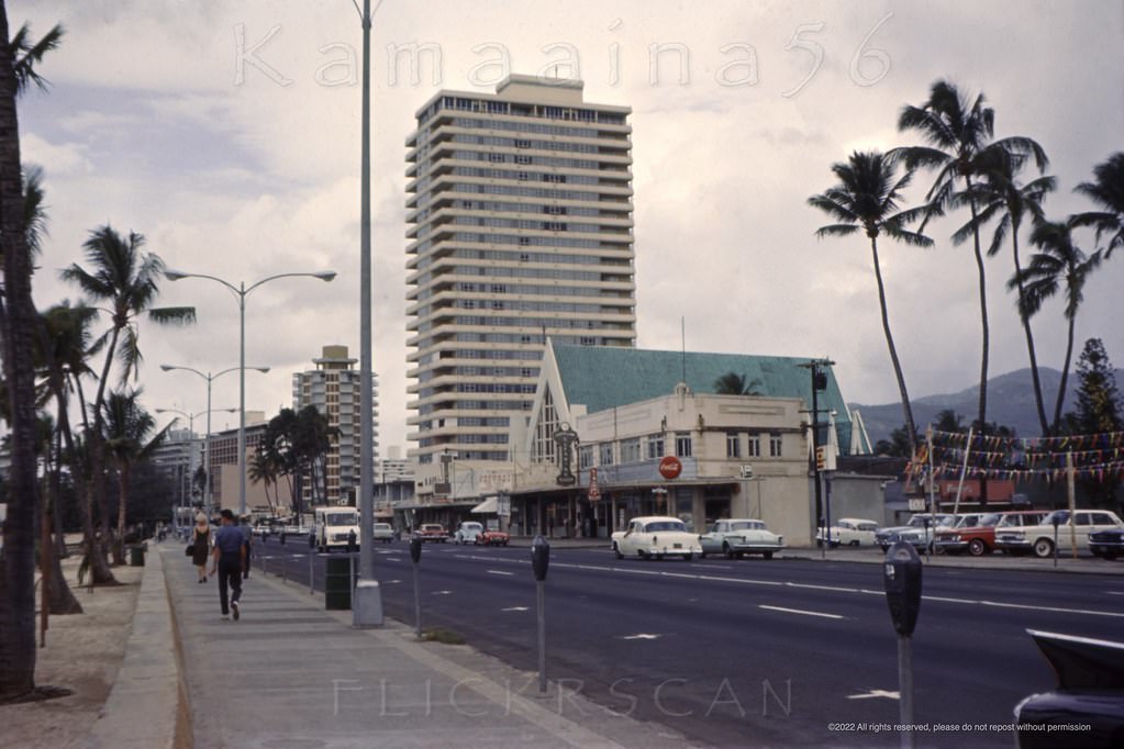 Kind of a grim view of the Diamond Head (east) end of Waikiki’s Kalakaua Avenue looking Ewa (west) from between Paoakalani and Kapahulu Avenues, 1964