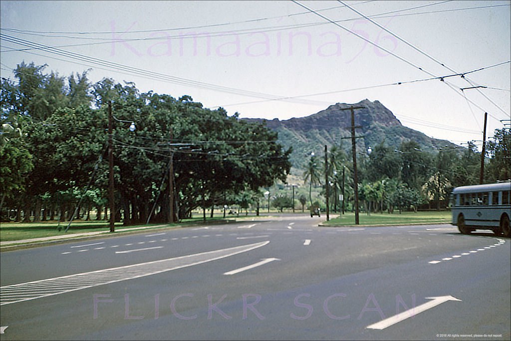 Kind of unusual photo of an HRT (Honolulu Rapid Transit) electric trolley bus making a wide U-turn at the Kalakaua - Monsarrat Avenue intersection, 1940s