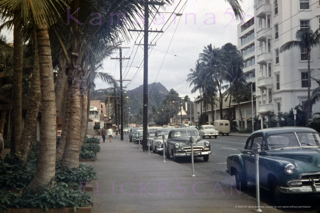 Waikiki street scene taken during the filming of the 1956 Jane Russell/Richard Egan WWII drama “The Revolt of Mamie Stover.”, 1956