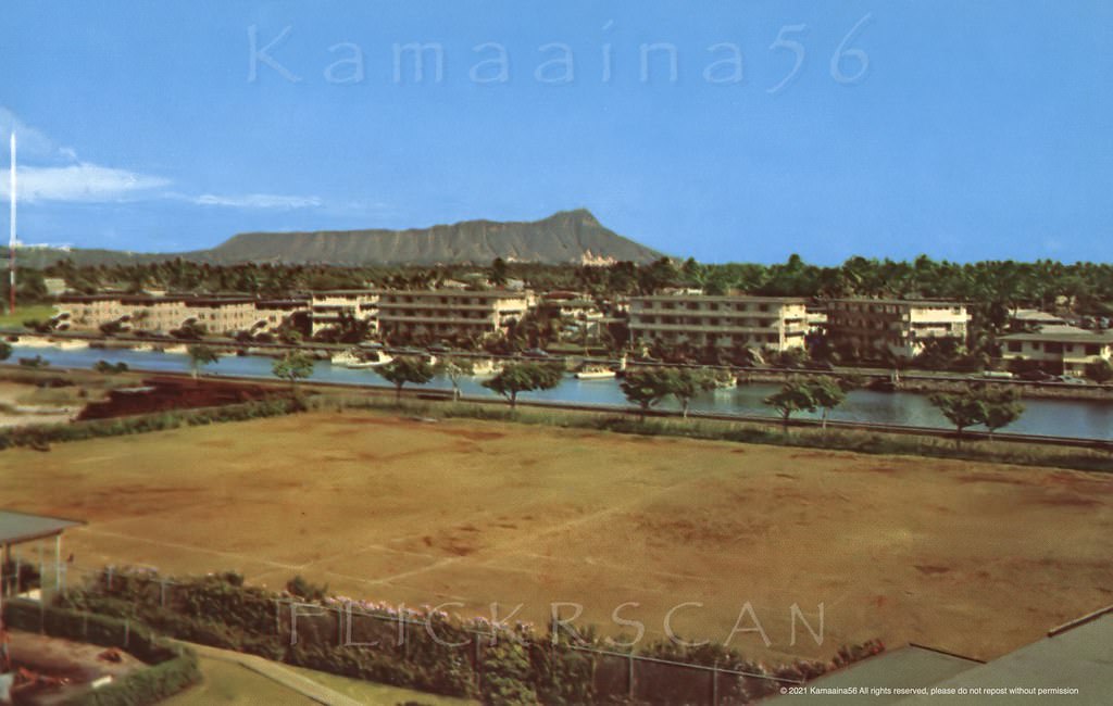 The Ala Wai Terrace Apartments looking Diamond Head across the Ala Wai Canal from the Central Branch YMCA on Atkinson Drive, 1959