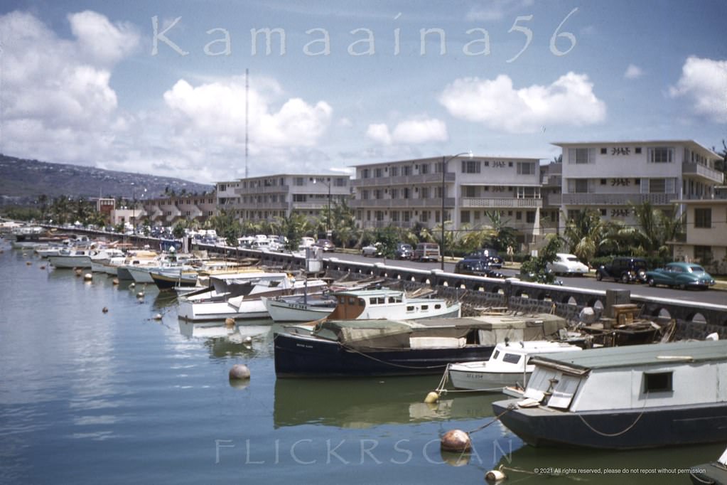 Hotelier Roy Kelley’s Ala Wai Terrace Apartments back when boats that could pass under the Ala Moana Avenue Bridge were allowed to moor along the canal, 1952
