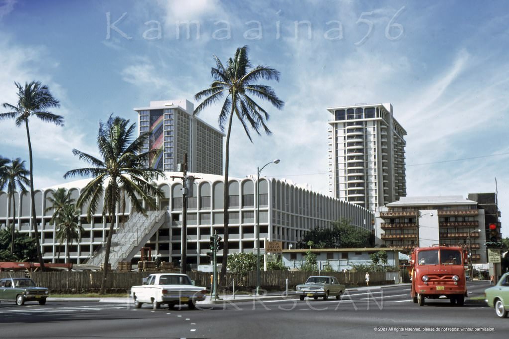 Street level view of the high-rise towers and the parking structure required to handle the increasing number of guests at Waikiki’s Hilton Hawaiian Village Hotel, 1971
