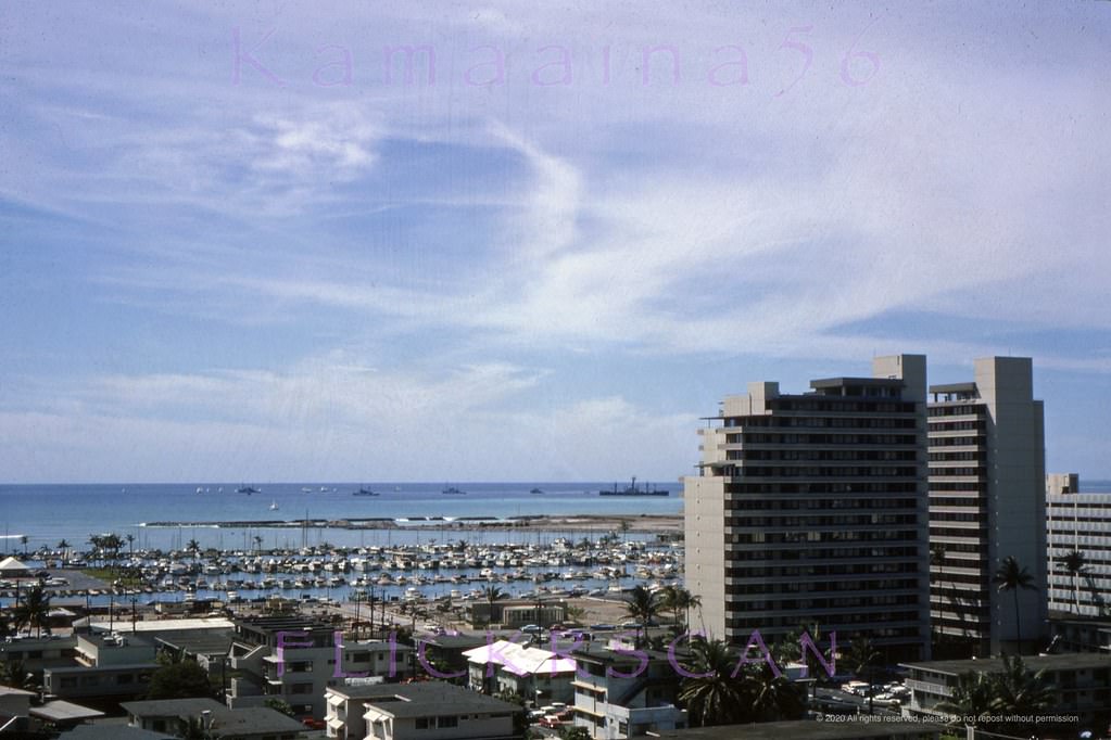 Beautifully detailed aerial view of Waikiki’s Hobron Lane area next to Ala Wai Harbor on south shore Oahu, 1963.