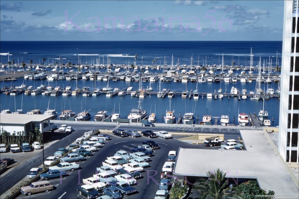 Unusual view of Ala Wai Yacht Harbor apparently taken from an upper balcony at the 10-story Driftwood Hotel across Ala Moana Blvd., 1962