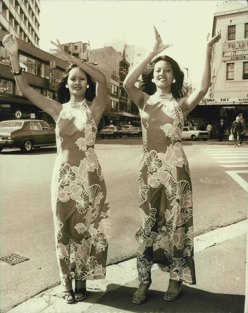 Hawaiian dancers Carmella Barut and Marlene Kalahiki give an impromtu hula dance outside the Hyatt Kingsgate Hotel Kings, 1976