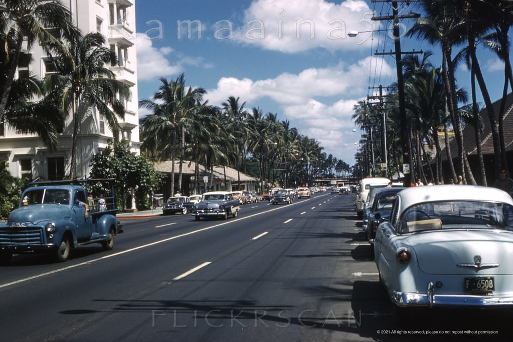 Looking Ewa (more or less west here) along Waikiki's Kalakaua avenue from the intersection with Kaiulani Avenue, 1962