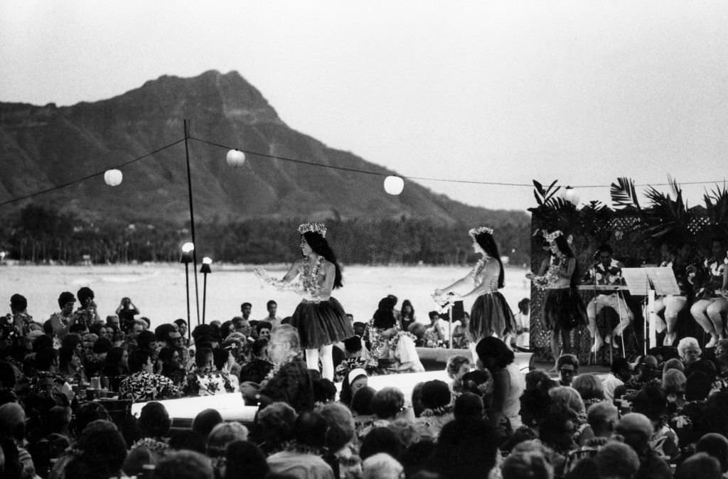 Traditional Hawaiian dancers on the terrace of the 'Royal Hawaiian Hotel' in Waikiki, 1970