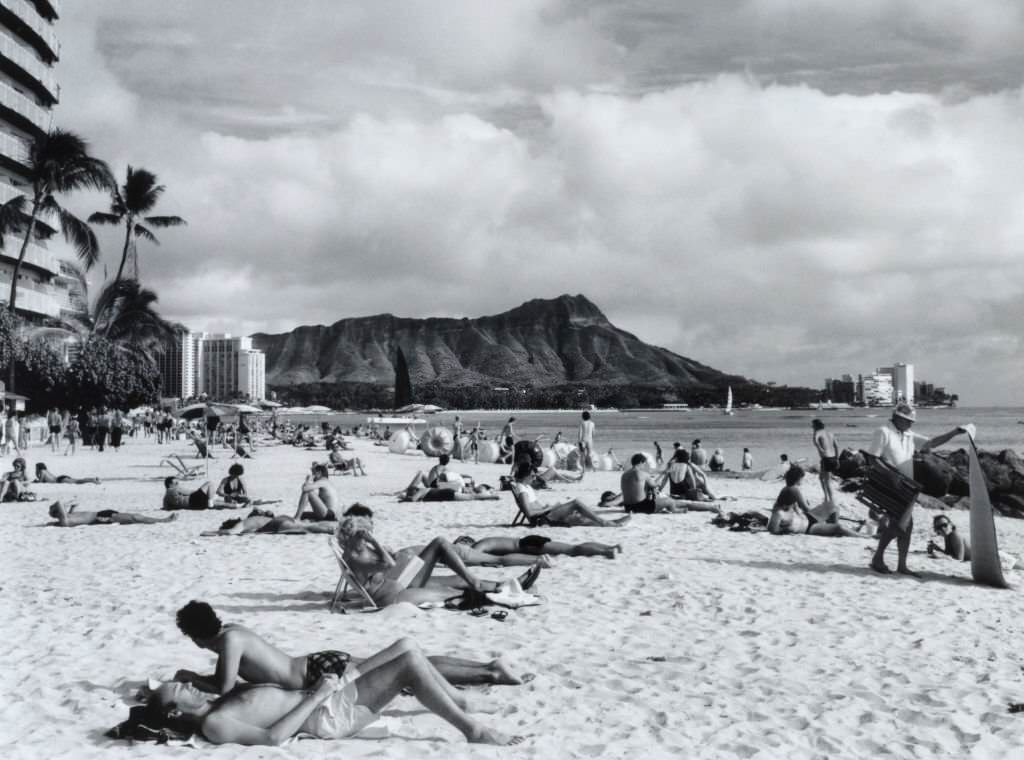 Waikiki Beach, with sunbathers, 1970