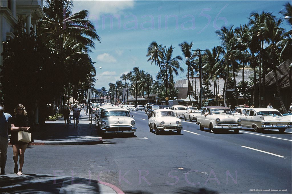 Waikiki’s busy Kalakaua Avenue from in front of the Moana Hotel, 1962