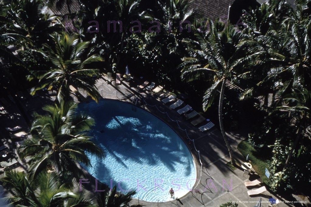 Looking down on the courtyard swimming pool from an upper floor at Waikiki's Princess Kaiulani Hotel, 1958