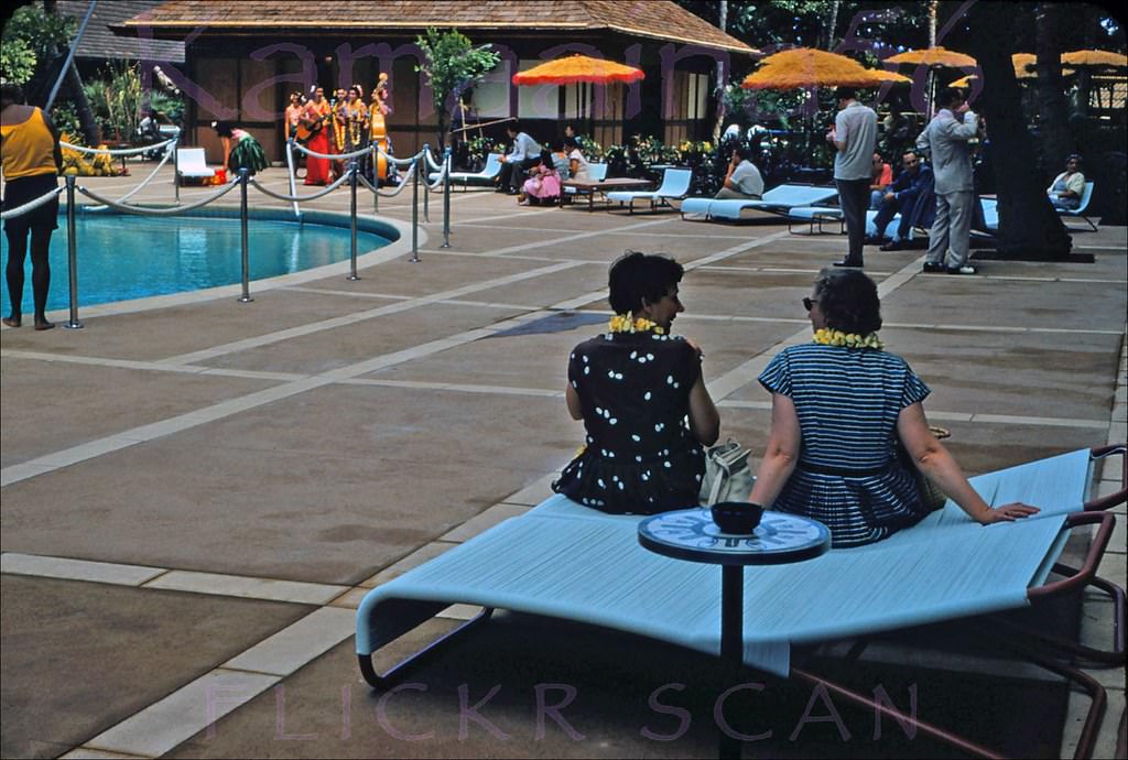 Hawaiian entertainment about to begin at the Princess Kaiulani pool court, 1955