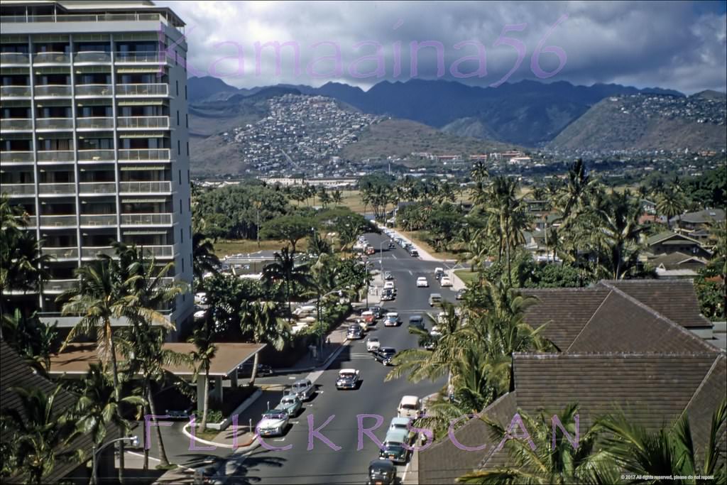 Looking inland along Waikiki’s Kaiulani Avenue from an upper floor at the 8-story Surfrider Hotel on Kalakaua Avenue, 1958