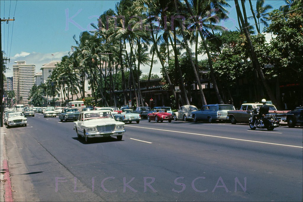 Looking east along Kalakaua Avenue from around where the Waikiki Theater, 1963