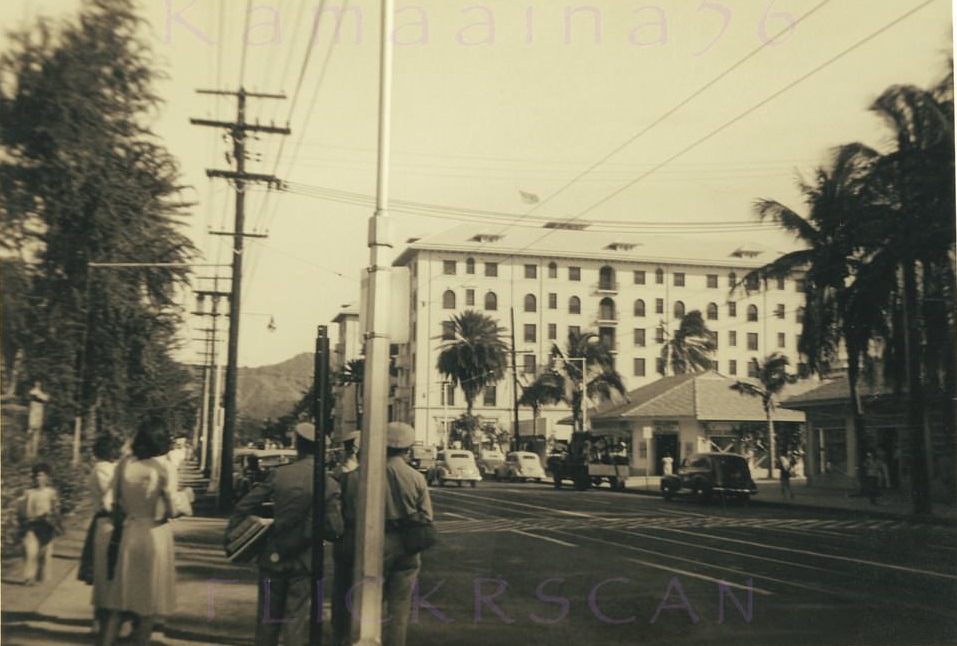Wartime streetview of Kalakaua Avenue looking more or less east from the bus stop at the Waikiki Theater Block, 1940s
