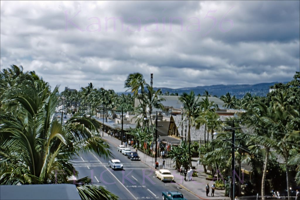 Slightly shaky but still interesting aerial view looking more or less west along Waikiki’s Kalakaua Avenue, 1959