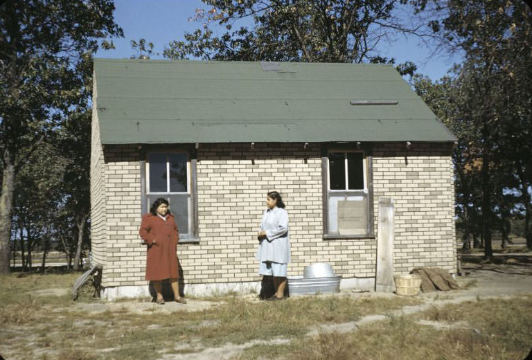 Girls by house, Bethany Indian Mission, Wittenberg, Wisconsin, 1953