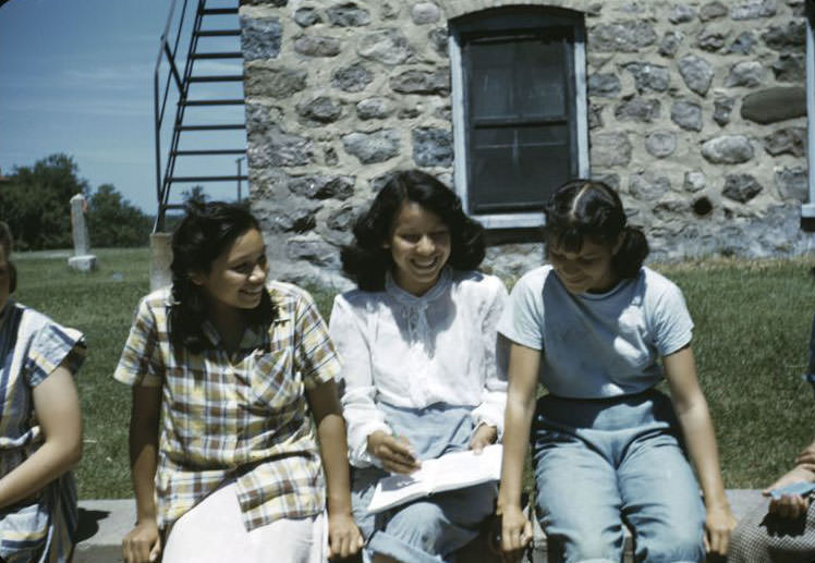 Girls relax in the sun, Bethany Indian Mission, Wittenberg, Wisconsin, 1953