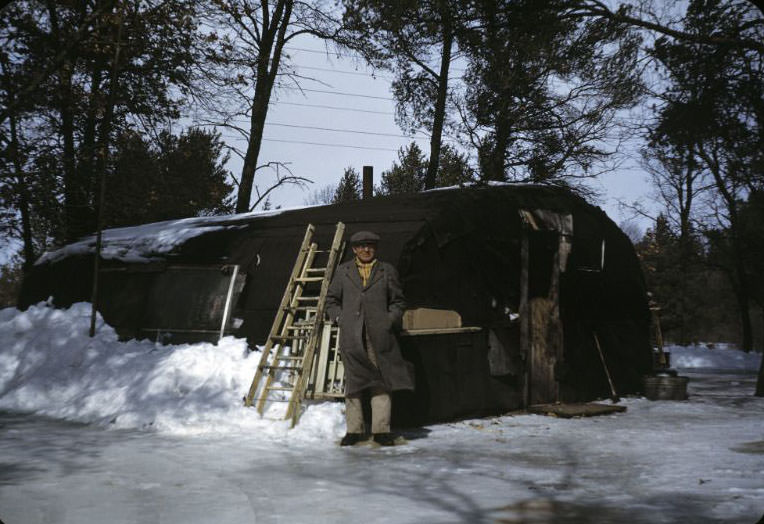 Man by dugout house, Bethany Indian Mission, Wittenberg, Wisconsin, 1953