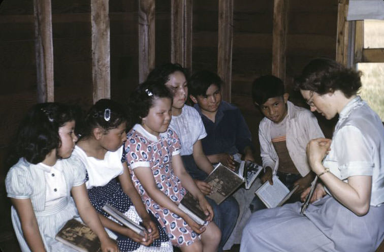 Parish worker with Indian children, Bethany Indian Mission, Wittenberg, Wisconsin, 1953