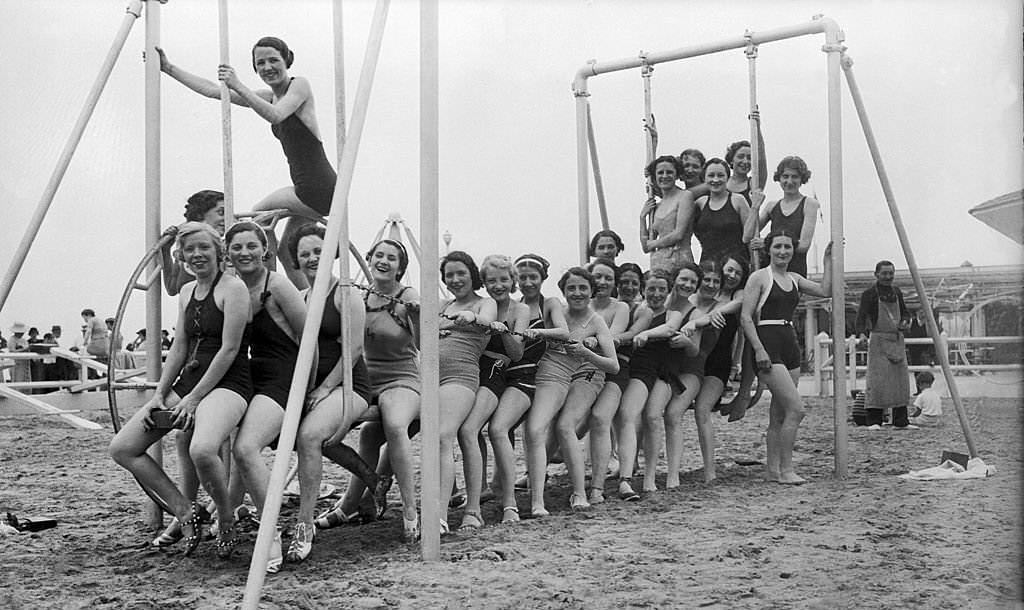 People Enjoying at France's glamorous Deauville beach from the early 20th Century