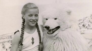 Germans Posing with Polar Bear Mascots