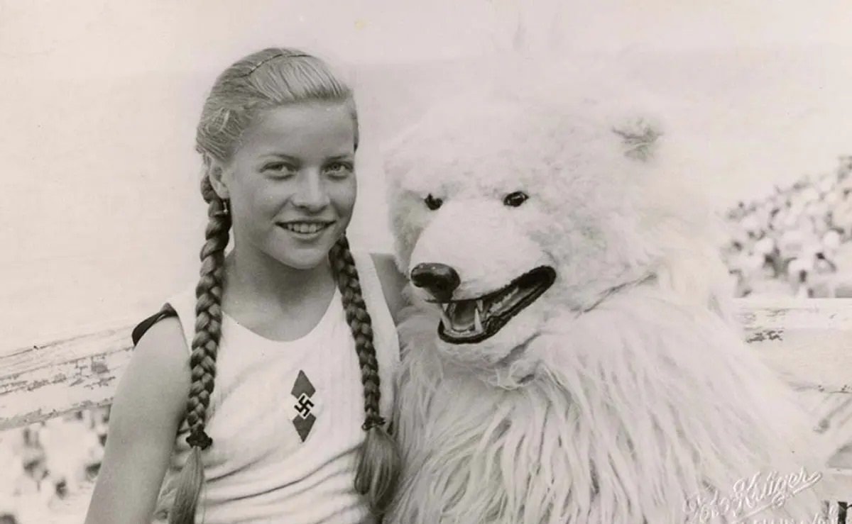 Germans Posing with Polar Bear Mascots
