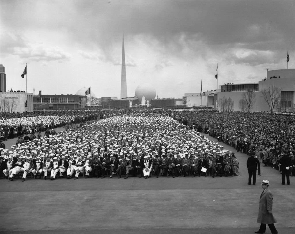 Crowd at the opening ceremony of New York World's Fair. The Trylon and Perisphere are in the background.