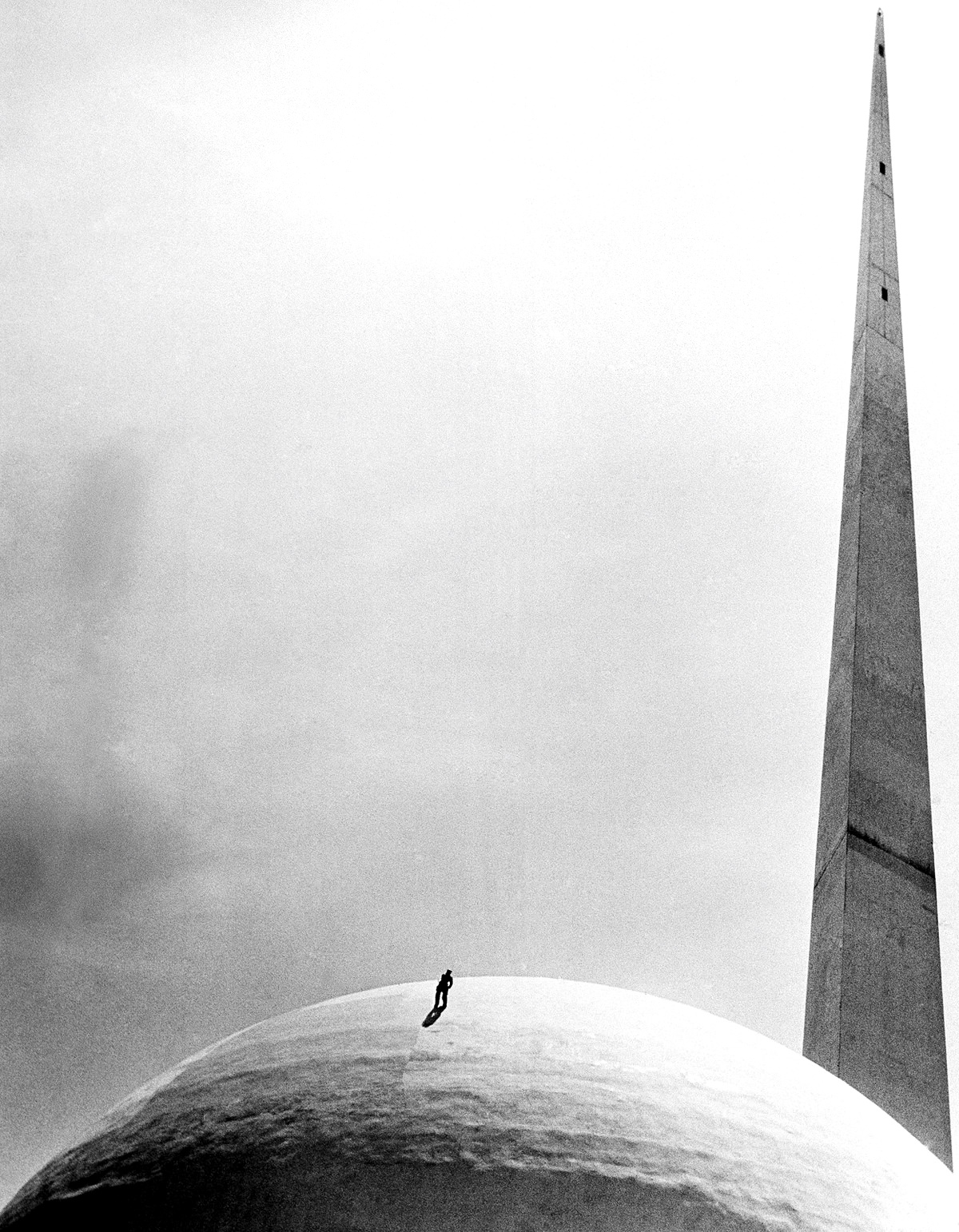 A workman at New York World's Fair repaints the famed Perisphere, on June 6, 1939.