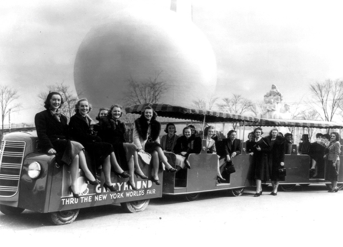 Members of the New York World's Fair staff, on a tractor train in 1939.