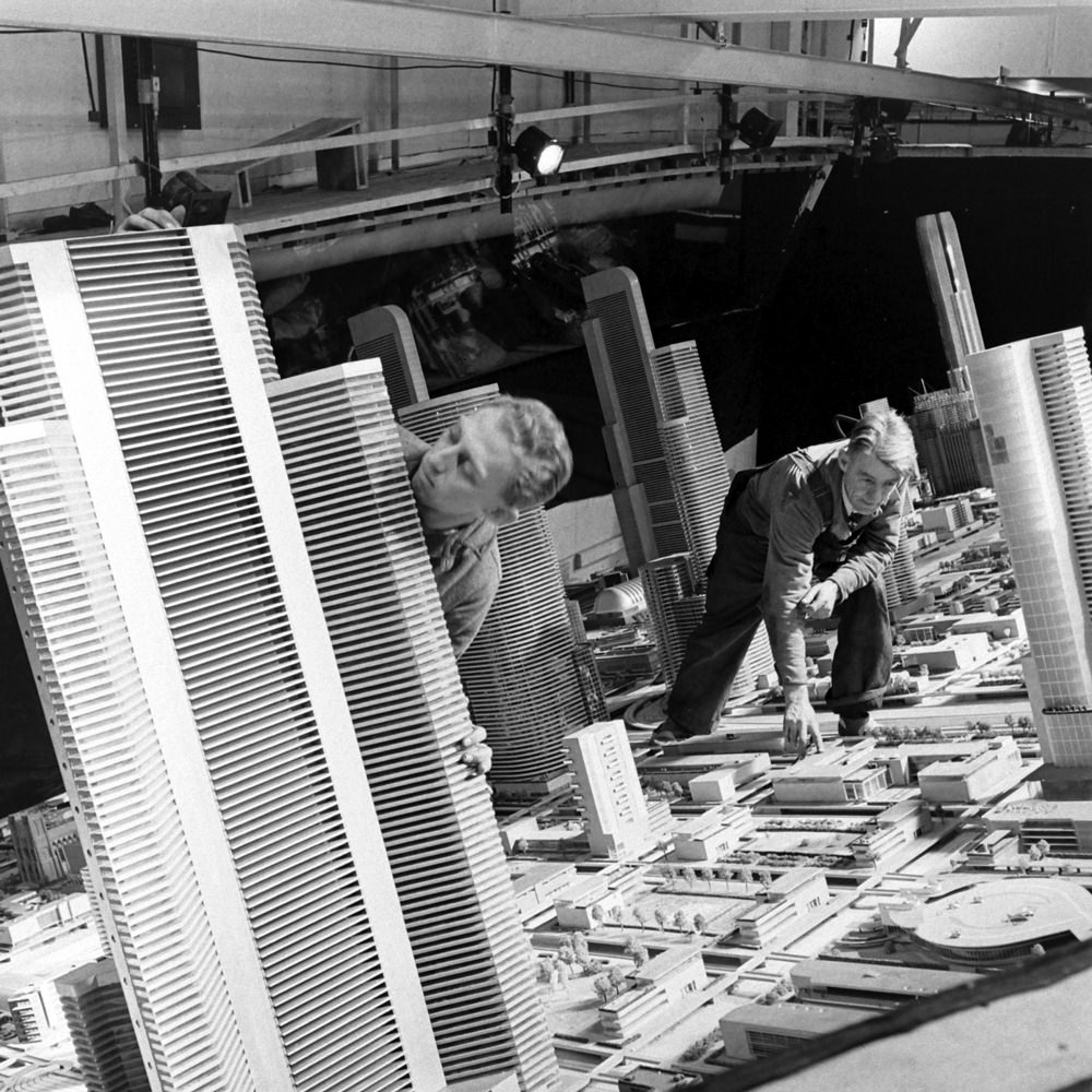 Craftsmen work on a huge architectural model of “the city of the future” at the 1939 World’s Fair.