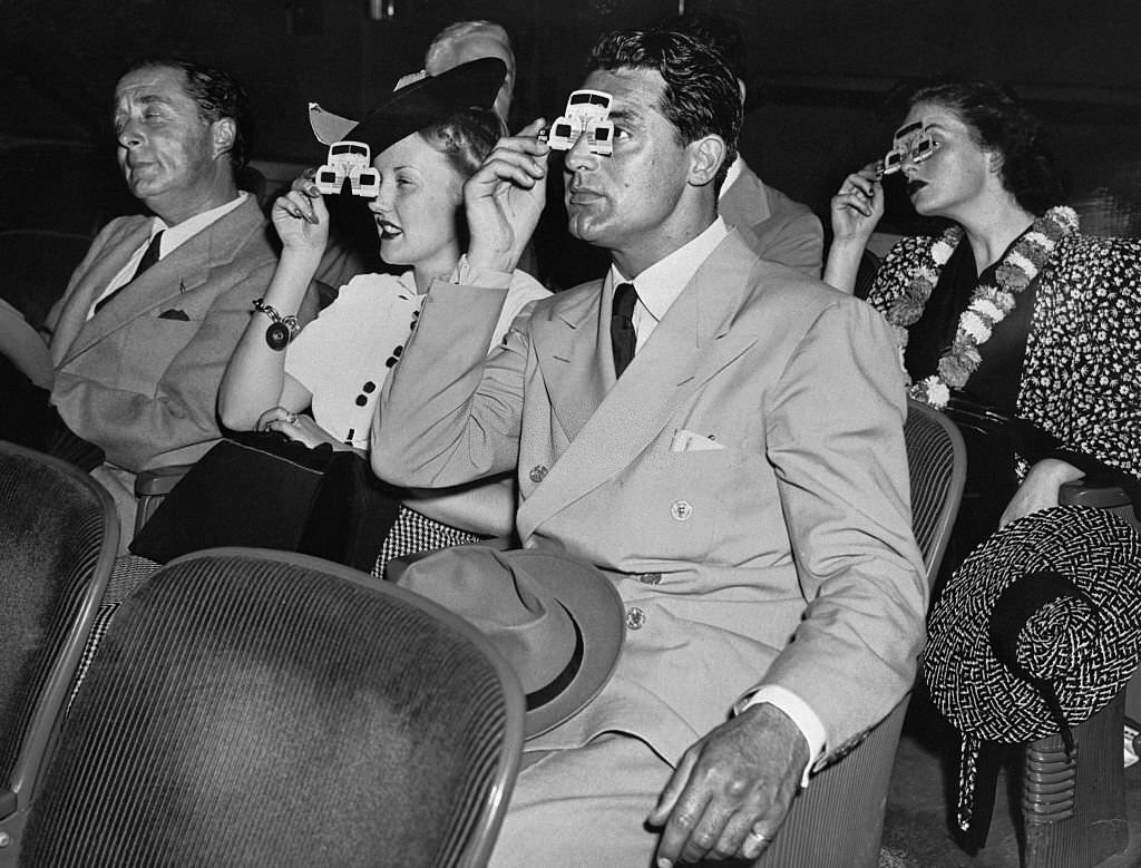 Cary Grant and Phyllis Brooks at the Polaroid movie in the Chrysler Building at the New York's World Fair.
